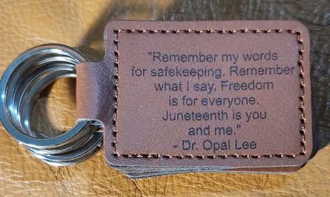 Dr. Lee's words were engraved onto leather keychains to be given as reading prizes. Hopefully some will find their way onto backpacks and into pockets—and perhaps inspire someone to ask, “Who is Dr. Opal Lee?”