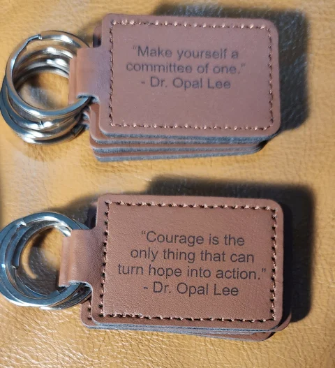 Dr. Lee's words were engraved onto leather keychains to be given as reading prizes. Hopefully some will find their way onto backpacks and into pockets—and perhaps inspire someone to ask, “Who is Dr. Opal Lee?”